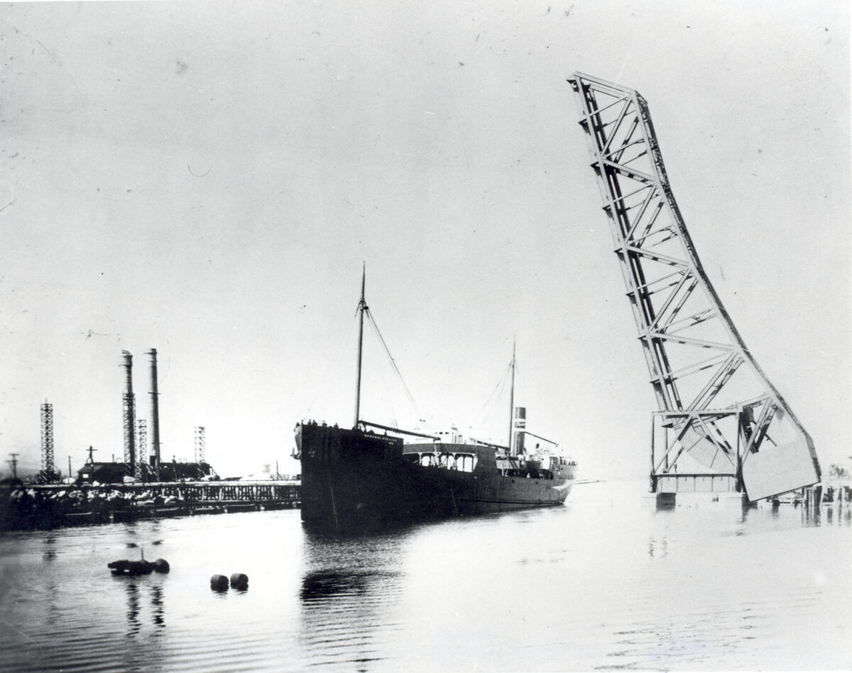 The General Hubbard sails out of Long Beach Harbor under the jack-knife bridge sometime in the 1910s.