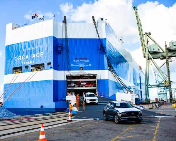 New automobiles disembark from the ship that brought them thousands of miles. (Photo: JAXPORT)
